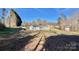 Ranch-style home on a large lot with a view of the surrounding landscape at 940 Devil Track Rd, Taylorsville, NC 28681