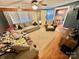 Living room with hardwood floors, a comfy couch, and access to the dining area at 940 Devil Track Rd, Taylorsville, NC 28681