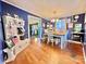 Charming dining area with white table and chairs at 940 Devil Track Rd, Taylorsville, NC 28681