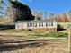 Single-story home with deck and large yard at 940 Devil Track Rd, Taylorsville, NC 28681