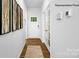 Bright foyer with hardwood floors and French doors at 128 Meadow View Dr, Statesville, NC 28677