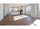 Open concept dining area adjacent to kitchen, featuring hardwood floors at 2220 Noble Townes Way, Charlotte, NC 28262