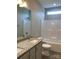 Main bathroom with granite double vanity and bathtub at 3010 Forbes Rd, Gastonia, NC 28056