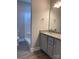 Bathroom with granite countertop double vanity and shower at 3010 Forbes Rd, Gastonia, NC 28056