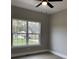 Bedroom with large window offering natural light and vinyl flooring at 3010 Forbes Rd, Gastonia, NC 28056