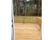 Newly built wooden deck overlooking a wooded backyard at 3010 Forbes Rd, Gastonia, NC 28056