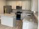 Modern kitchen with granite countertops and light gray cabinets at 3010 Forbes Rd, Gastonia, NC 28056
