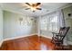 Bright bedroom with hardwood floors and window seating at 3520 Ritch Ave, Charlotte, NC 28206