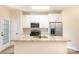 Modern kitchen with granite countertops and stainless steel appliances at 9036 Bradstreet Commons Way, Charlotte, NC 28215