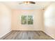 Spacious bedroom with hardwood floors and large window at 9036 Bradstreet Commons Way, Charlotte, NC 28215