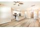 Open kitchen features granite countertops, stainless steel appliances, and an island at 9036 Bradstreet Commons Way, Charlotte, NC 28215