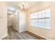 Dining room with hardwood floors and chandelier at 9036 Bradstreet Commons Way, Charlotte, NC 28215