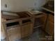 Unfinished kitchen with wood cabinets and sink at 495 Carver St, Kannapolis, NC 28083