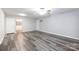 Bright living room featuring wood-look floors and a ceiling fan at 1541 Hunt Club Ct, Rock Hill, SC 29732
