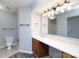 Bathroom with updated vanity, lighting, and vinyl flooring at 1541 Hunt Club Ct, Rock Hill, SC 29732