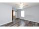 Spacious bedroom with hardwood floors and sliding glass door to patio at 1541 Hunt Club Ct, Rock Hill, SC 29732