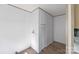Bright laundry room with built-in shelving and space for a full-size washer and dryer at 210 Sailwinds Rd, Mooresville, NC 28115