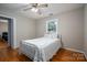 Charming bedroom with a metal bed frame and a window at 3026 Hazel Dr, Shelby, NC 28152