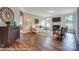 Living room with hardwood floors, fireplace, and ample natural light at 4025 Grace Pointe Dr # 105, Wesley Chapel, NC 28079