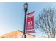 Belmont Home banner on a lamppost, showcasing The Abbey at 519 Winding Way # 5, Belmont, NC 28012