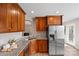 Kitchen with stainless steel appliances and ample wood cabinets at 12896 Hill Pine Rd, Midland, NC 28107