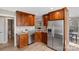 Modern kitchen with stainless steel appliances and corner sink at 12896 Hill Pine Rd, Midland, NC 28107