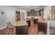 Modern kitchen with granite countertops and dark cabinets at 13002 Red Vulcan Ct, Charlotte, NC 28213