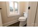 Small powder room with single toilet at 1451 Glasscock Rd # 9, Rock Hill, SC 29730