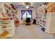 Bright library featuring floor to ceiling bookshelves and a workspace at 1515 Delview Rd, Cherryville, NC 28021