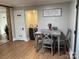 Cozy dining area with grey table and four chairs at 1614 West C St, Kannapolis, NC 28081