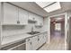 Updated kitchen features white shaker cabinets, subway tile backsplash and stainless steel appliances at 1830 Ebenezer Rd, Rock Hill, SC 29732