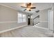 Bright living room with neutral walls, hardwood floors and access to staircase at 1830 Ebenezer Rd, Rock Hill, SC 29732