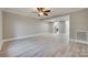 Spacious living room with light gray walls and wood-look floors at 1830 Ebenezer Rd, Rock Hill, SC 29732