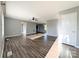 Spacious living room with hardwood floors and ceiling fan at 2172 Robert Usher Rd, Lancaster, SC 29720