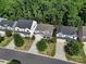 Aerial view of a charming neighborhood with houses and lush green trees at 3073 Cedric Ct, Fort Mill, SC 29715