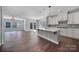 Open concept kitchen with island and hardwood floors at 3073 Cedric Ct, Fort Mill, SC 29715