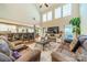 Relaxing living room with a cozy fireplace and large windows at 10126 Loch Lomond Dr, Charlotte, NC 28278