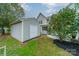 Detached storage shed in the backyard at 10126 Loch Lomond Dr, Charlotte, NC 28278