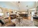 Open living room with a comfortable seating area and high ceilings at 10126 Loch Lomond Dr, Charlotte, NC 28278