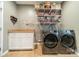 Convenient laundry room with washer, dryer and ample storage at 10126 Loch Lomond Dr, Charlotte, NC 28278