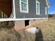 Unfinished brick basement with access door at 1517 Sugarfarm Rd, Catawba, NC 28609