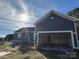 Newly built home with gray siding and attached garage at 1517 Sugarfarm Rd, Catawba, NC 28609