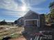 Newly built home with gray siding and attached garage at 1517 Sugarfarm Rd, Catawba, NC 28609