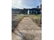 Gravel driveway leading to a new construction home at 1517 Sugarfarm Rd, Catawba, NC 28609