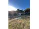 Overgrown lot with a small shed in the distance at 1517 Sugarfarm Rd, Catawba, NC 28609