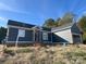 Single story home with gray siding and a brick base at 1517 Sugarfarm Rd, Catawba, NC 28609