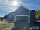 Newly built home with gray siding and attached garage at 1517 Sugarfarm Rd, Catawba, NC 28609