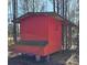 Red wooden chicken coop with nesting boxes at 1627 Peden Bridge Rd, Chester, SC 29706