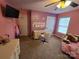 Charming bedroom with a desk and neutral carpeting at 1627 Peden Bridge Rd, Chester, SC 29706