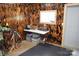 Storage area with work table and various supplies at 1627 Peden Bridge Rd, Chester, SC 29706